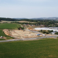Druhá etapa rozvoje A.W. v Lošticích pokračuje. Dokončená infrastruktura otevírá cestu retail parku i novému výrobnímu závodu